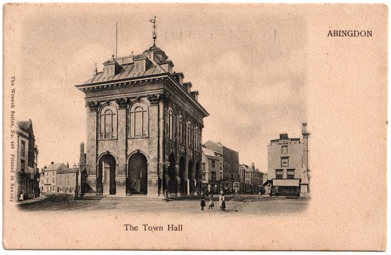 The front of an old postcard. The postcard is of Abingdon: Marketplace