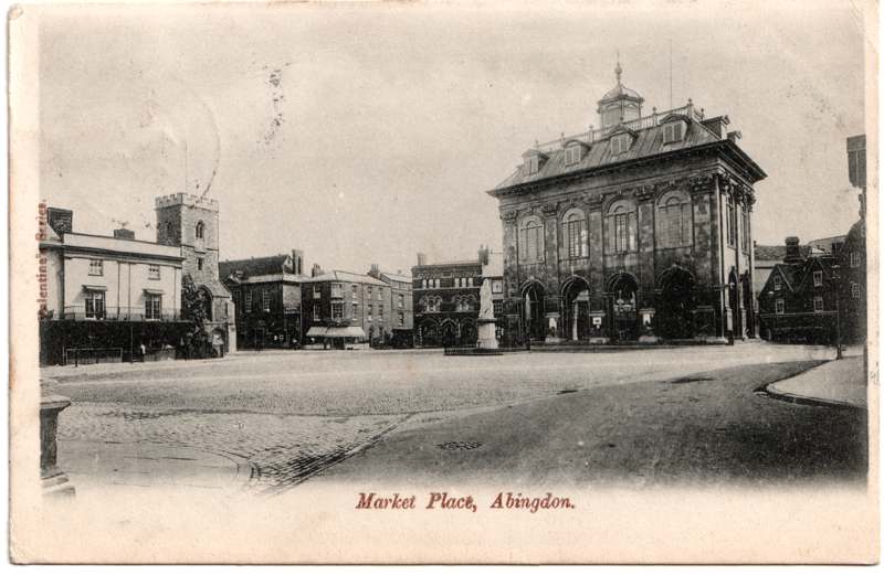 The front of an old postcard. The postcard is of Abingdon: Marketplace