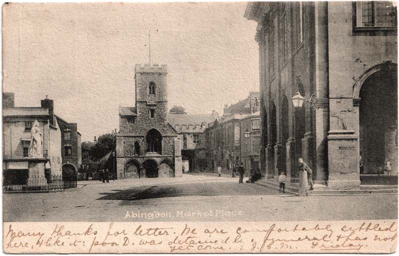 The front of an old postcard. The postcard is of Abingdon: Marketplace