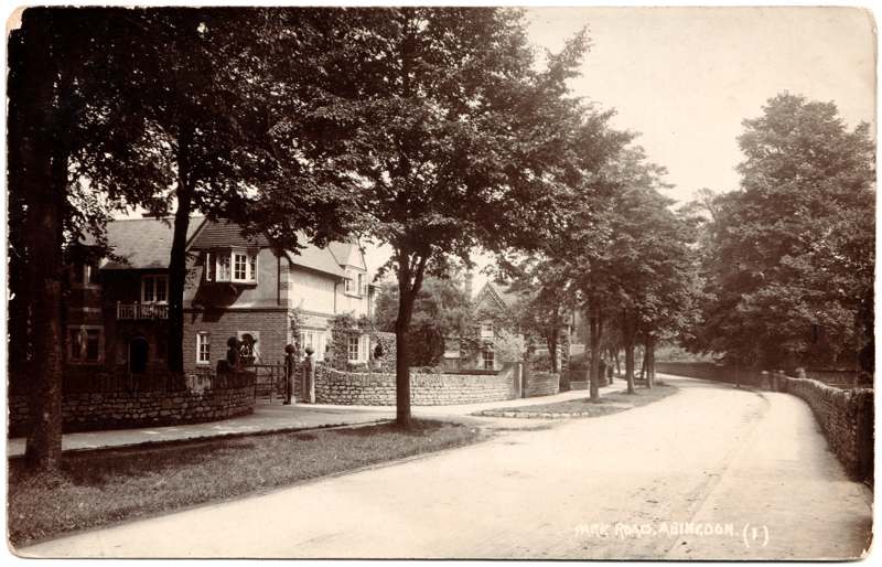The front of an old postcard. The postcard is of Abingdon: Albert Park and Abingdon School