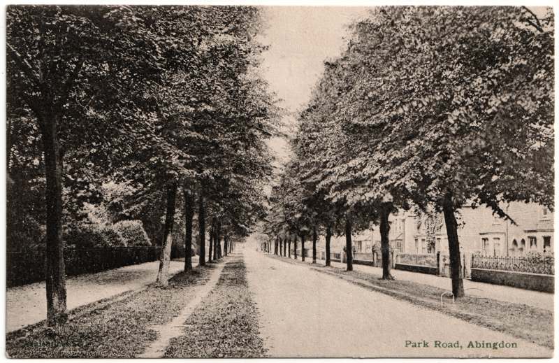 The front of an old postcard. The postcard is of Abingdon: Albert Park and Abingdon School