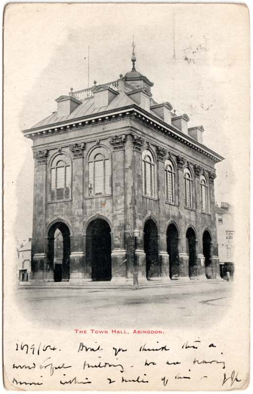 The front of an old postcard. The postcard is of Abingdon: Marketplace