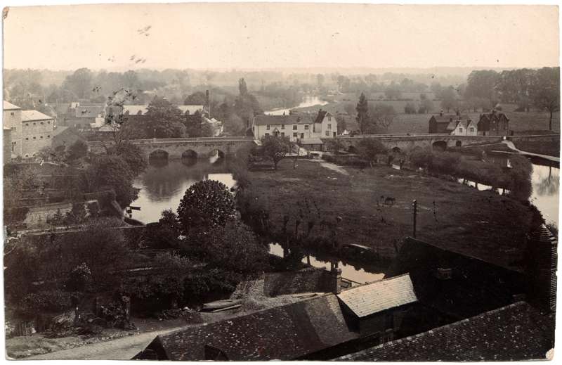 The front of an old postcard. The postcard is of Abingdon: The Bridge