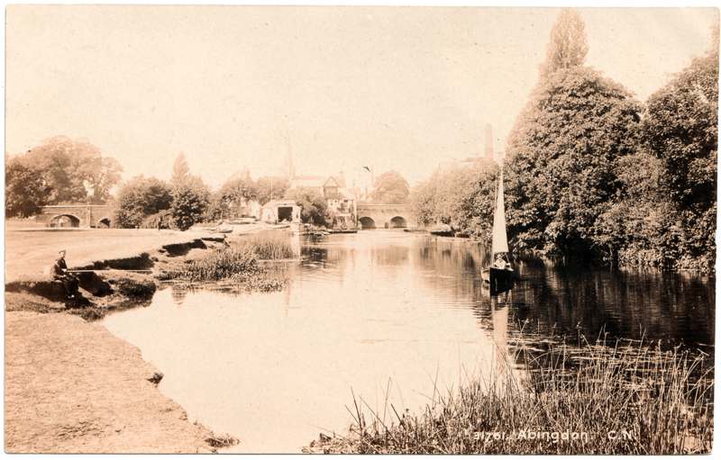 The front of an old postcard. The postcard is of Abingdon: The Bridge