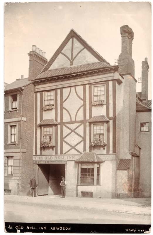 The front of an old postcard. The postcard is of Abingdon: East St Helen Street