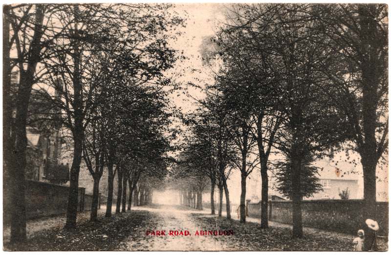The front of an old postcard. The postcard is of Abingdon: Albert Park and Abingdon School