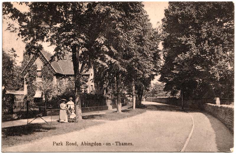 The front of an old postcard. The postcard is of Abingdon: Albert Park and Abingdon School