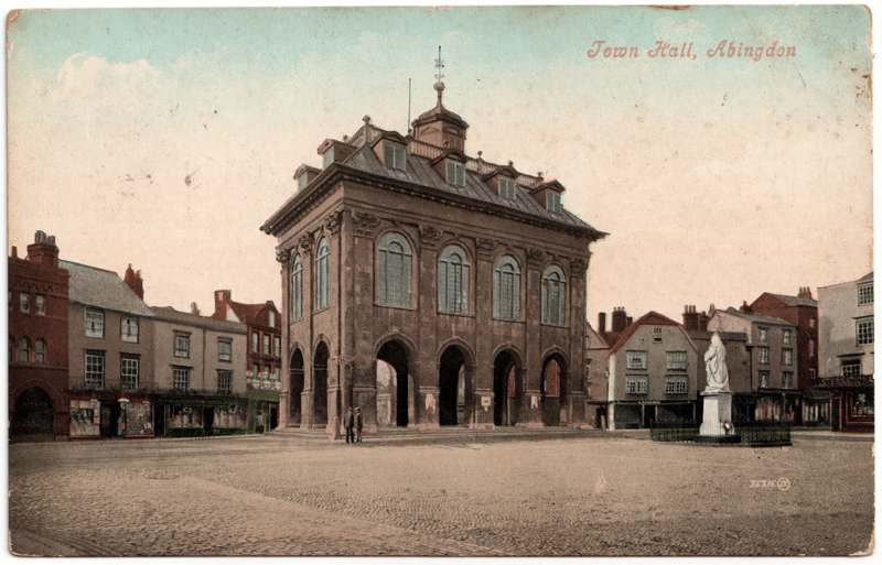 The front of an old postcard. The postcard is of Abingdon: Marketplace