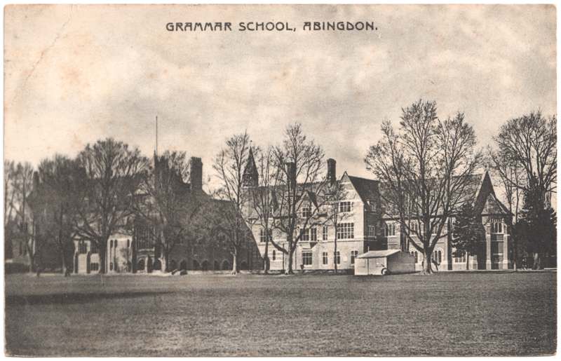 The front of an old postcard. The postcard is of Abingdon: Schools