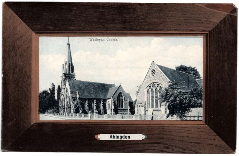 The front of an old postcard. The postcard is of Abingdon: Other Streets
