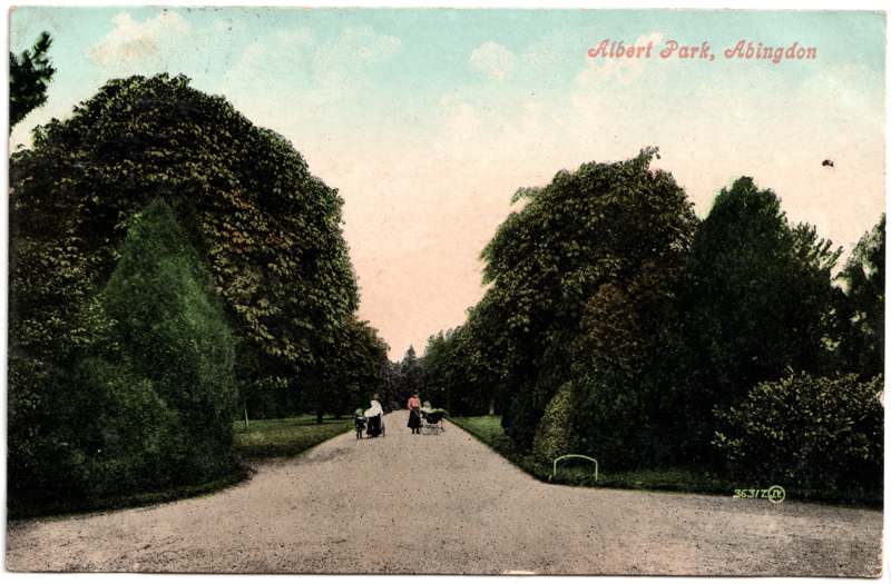 The front of an old postcard. The postcard is of Abingdon: Albert Park and Abingdon School