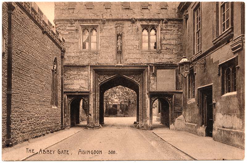 The front of an old postcard. The postcard is of Abingdon: Abbey Gateway