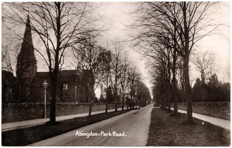 The front of an old postcard. The postcard is of Abingdon: Albert Park and Abingdon School