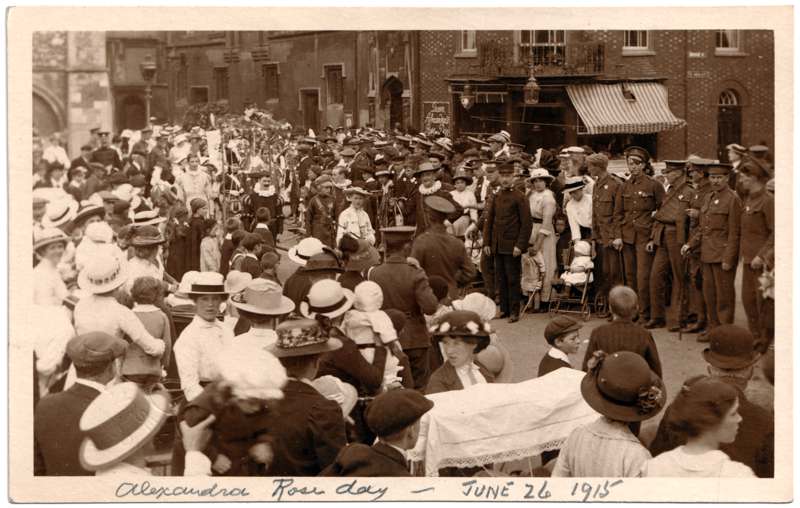 The front of an old postcard. The postcard is of Abingdon: Abbey Gateway