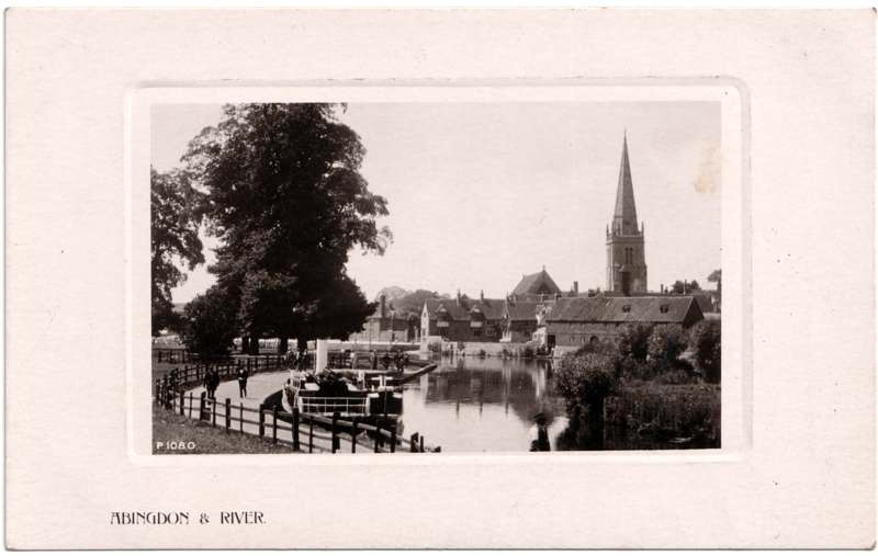 The front of an old postcard. The postcard is of Abingdon: St. Helen's from the Bridge