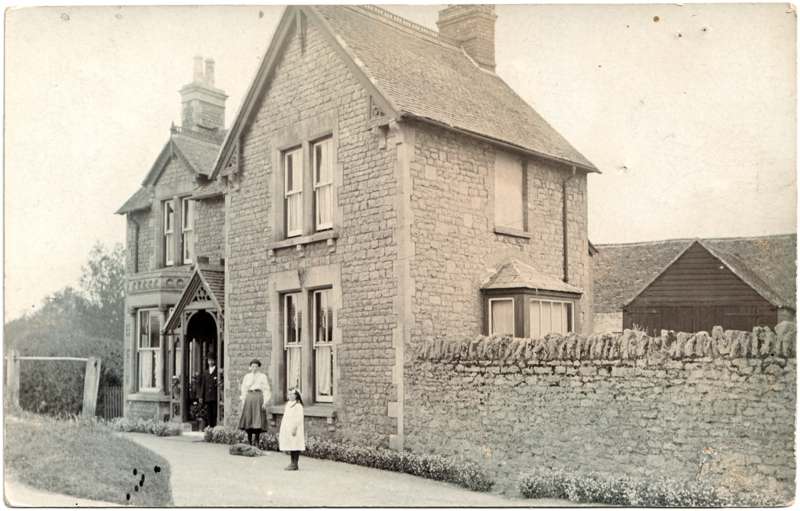The front of an old postcard. The postcard is of Abingdon: Other Streets
