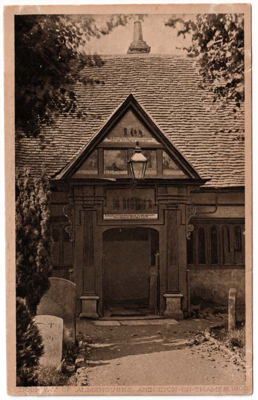 The front of an old postcard. The postcard is of Abingdon: Almshouses