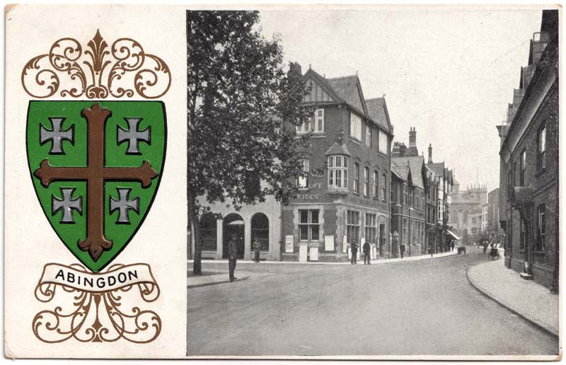The front of an old postcard. The postcard is of Abingdon: Town Centre Streets