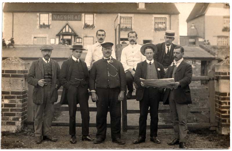 The front of an old postcard. The postcard is of Abingdon: The Bridge