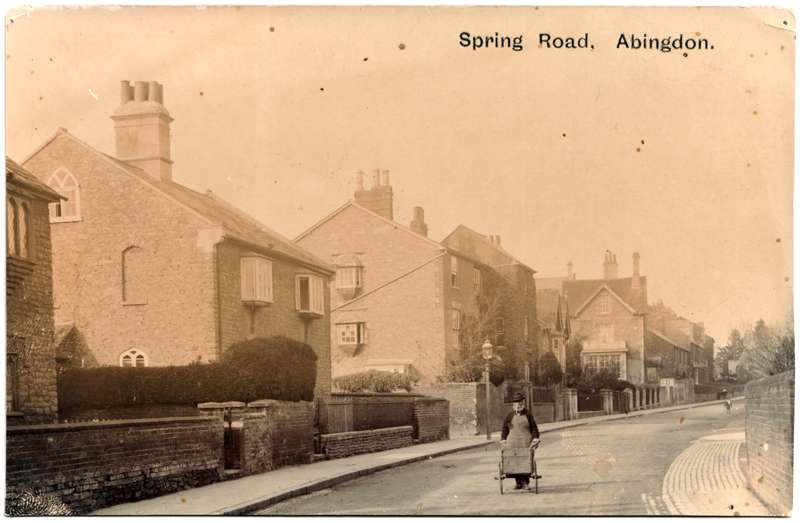The front of an old postcard. The postcard is of Abingdon: Other Streets