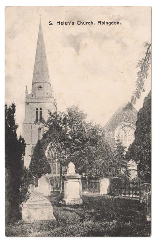 The front of an old postcard. The postcard is of Abingdon: St. Helen's Church and the Almshouses