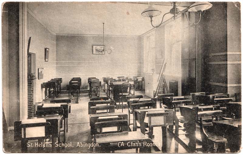 The front of an old postcard. The postcard is of Abingdon: Schools