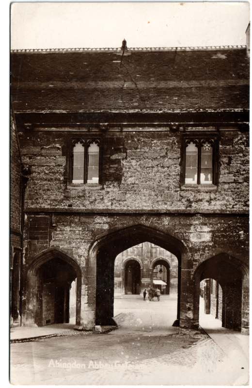 The front of an old postcard. The postcard is of Abingdon: Abbey Gateway