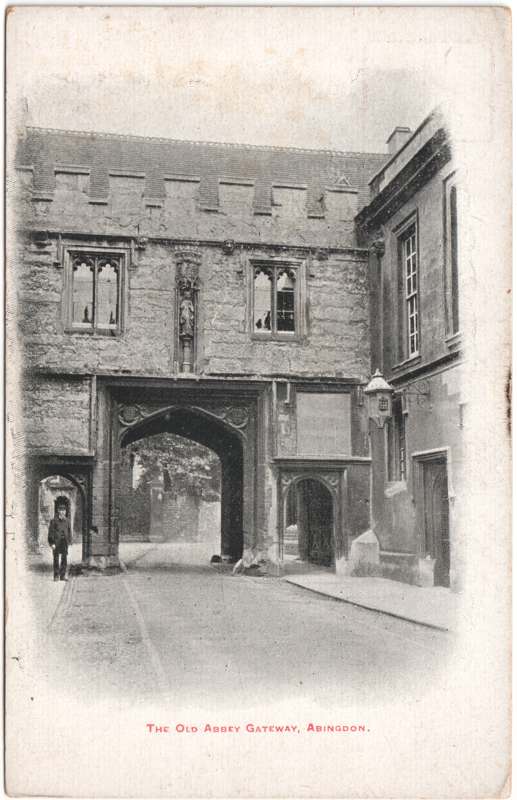 The front of an old postcard. The postcard is of Abingdon: Abbey Gateway