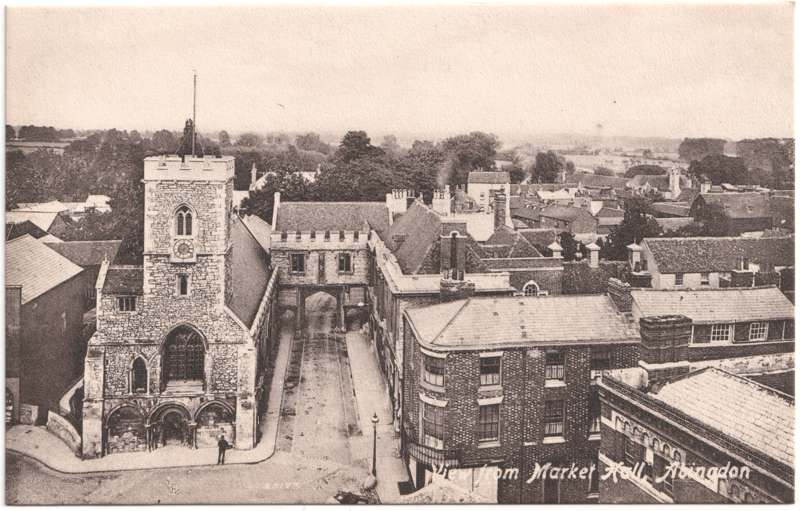 The front of an old postcard. The postcard is of Abingdon: Abbey Gateway