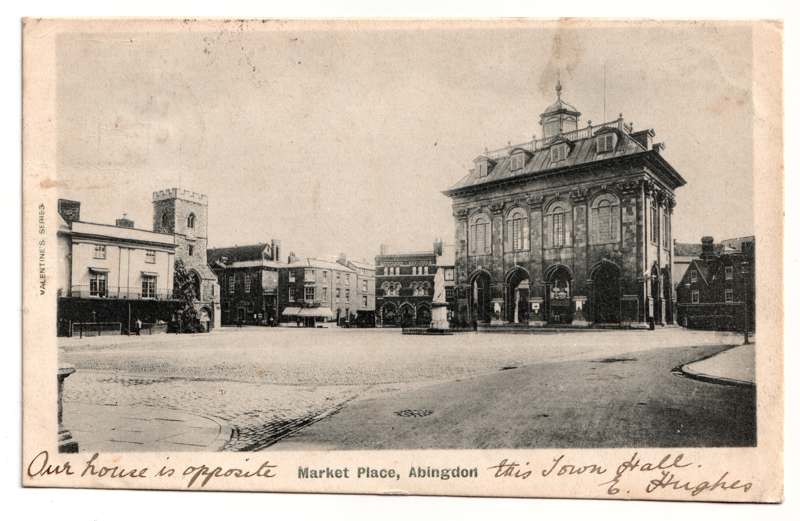 The front of an old postcard. The postcard is of Abingdon: Marketplace