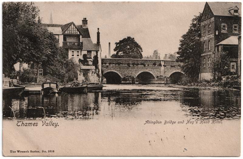 The front of an old postcard. The postcard is of Abingdon: The Bridge